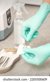 Hand Disinfects Tweezers With Cleaning Systems For Medical Instruments. Ultrasonic Cleaner