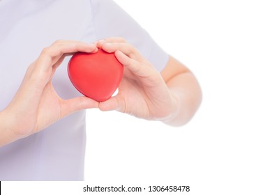 Hand Of Doctor Holding Red Hart Free From Copy Space For Health Care Or Valentine's Day Concept On White Background. 