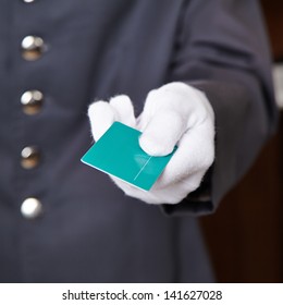 Hand Of Doorman Giving Key Card To Hotel Room