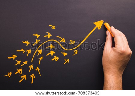 Hand draw a curve arrow leader with many small follower on chalkboard