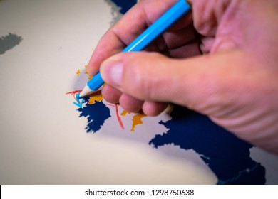 Hand Drawing A Blue Arrow Between The UK And Northern Ireland, Backstop And Brexit Concept. The Backstop Solution For The Irish Border Is One Of The Main EU And UK Negotiations.