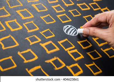 Hand drawing circle among square boxes, find your positioning, niche, or differentiation concept - Shutterstock ID 404623861