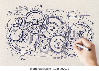 Hand drawing creative cogwheel sketch on concrete wall background. Device and system concept