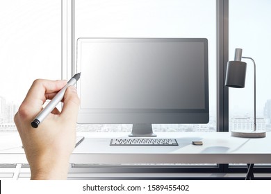 Hand drawing designer desktop with empty computer screen and lamp on table. Mock up, 3D Rendering
