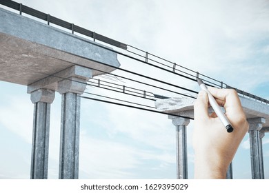 Hand drawing destroyed bridge on abstract sky background. Engineering and project concept.