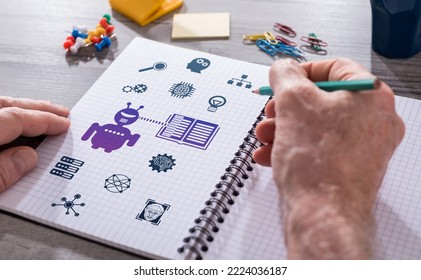 Hand drawing machine learning concept on a notepad