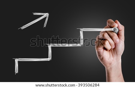 Hand drawing a stairs in a Conceptual Image