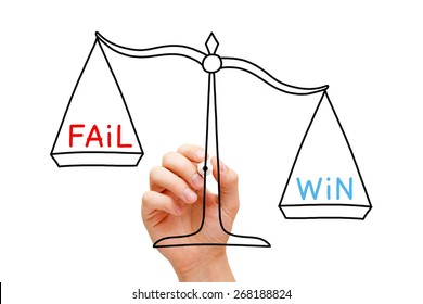 Hand drawing Win Fail scale concept with marker on transparent wipe board isolated on white. 