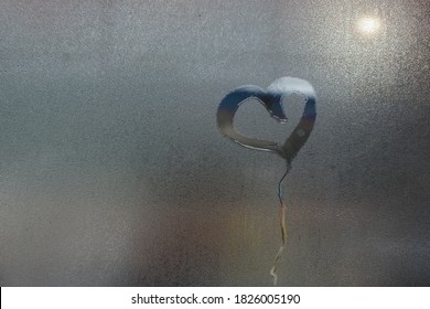 Hand Drawn Heart On Window.condensation Water Droplets In Mirror For Background.