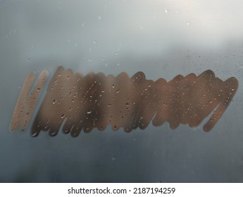 Hand Drawn Red Doodle Shape For Text On Muddy Blue Glass Wet Window In City