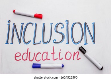 Hand drawn word "inclusion education" on marker board. Blue and black color, white background - Shutterstock ID 1624523590