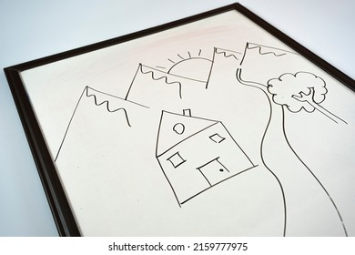 Hand drew house   river and black color marker whiteboard  childhood idea  drawing pictures  kids concept  sitting view