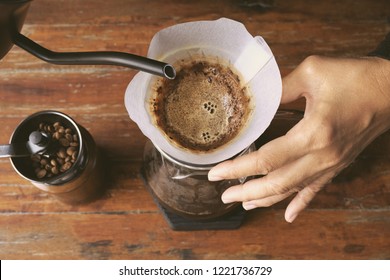 Hand drip coffee, Barista making drip coffee. Top view