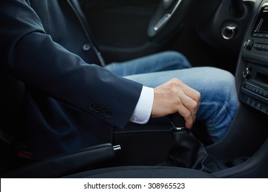 Hand Of The Driver On Manual Gear Shift Knob