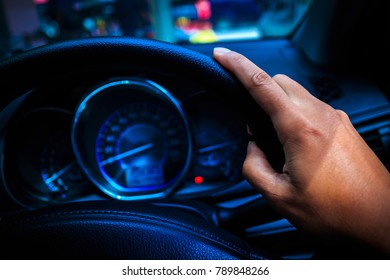 Hand driving a car - Shutterstock ID 789848266