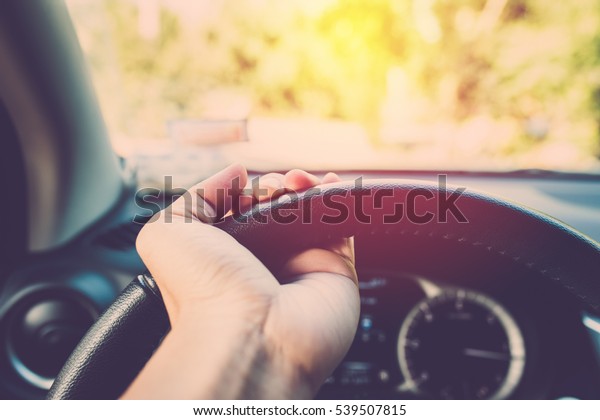 Hand driving car. Vintage\
filter