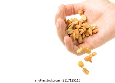 Hand Dropping Falling Peanut Kernels, With Copy Space.