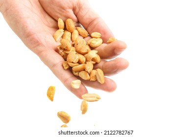 Hand Dropping Falling Peanut Kernels, With Copy Space.