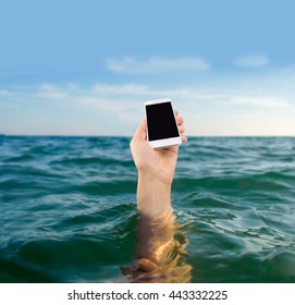 Hand Of A Drowning Man And Do Not Want Your Phone To Get Wet In The Ocean