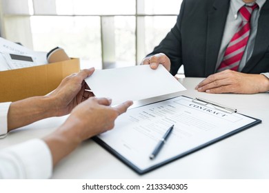 Hand of employer filing final remuneration after employee to write a document letter of resignation, resign concept. - Shutterstock ID 2133340305