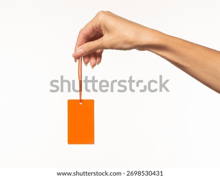 hand with an empty tag