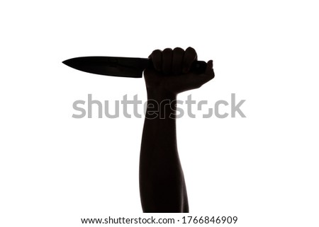 hand expressing abhorrence with kitchen knife in white backround. dramatic lights