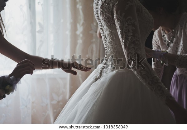 Hand Fasten Buttons On Wedding Dress People Stock Image