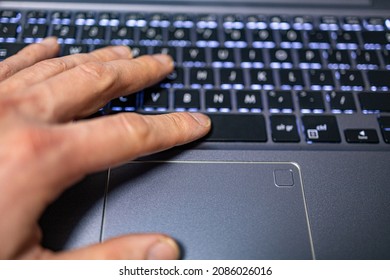 hand and finger on the spacebar and touchbar button. home office, quarantine