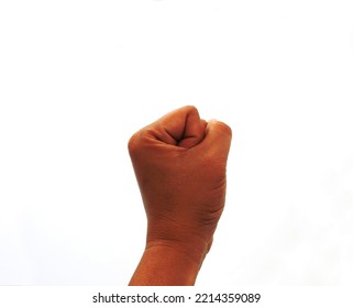 Hand With The Fist Making The Communism Symbol Isolated On White Background