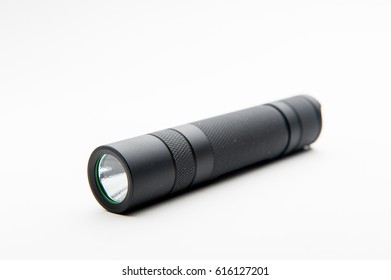Hand flashlight on white background