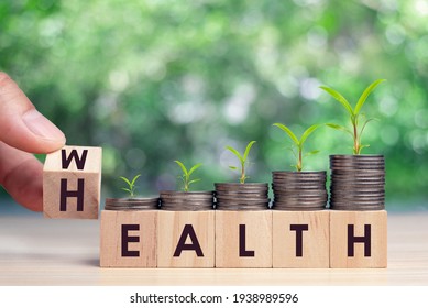 Hand flip wooden cube with word wealth to health with coins stack step up growing growth value. Investment in life insurance and healthcare concept - Shutterstock ID 1938989596