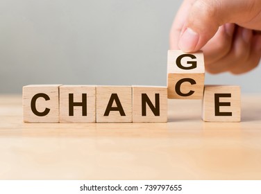 Hand flip wooden cube with word change to chance, Personal development and career growth or change yourself concept - Shutterstock ID 739797655