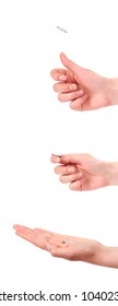 Hand Flipping A Coin  On White Background