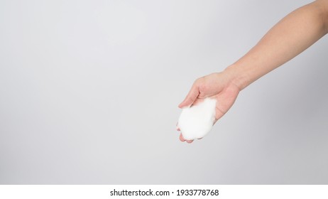 Hand With Foaming Hand Soap For Washing On White Background.