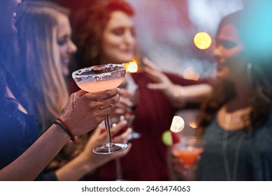 Hand, friends and cocktail with women in nightclub, event and conversation at happy hour. People, club and drink with cheers, alcohol and smile with celebration for new year with reunion in night - Powered by Shutterstock