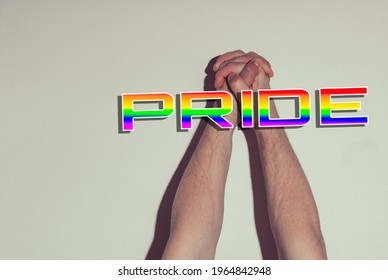 The Hand Of A Gay Boy With A Tattoo That Says Pride Symbol Of Liberation And Sexual Tolerance