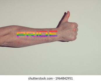 The Hand Of A Gay Boy With A Tattoo That Says Pride Symbol Of Liberation And Sexual Tolerance