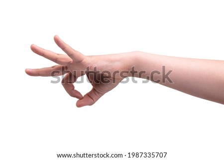 The hand gesture resembles a click flick. Isolated on white background.
