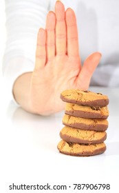 Hand Gesture Saying Stop Unhealthy Eating Chocolate Cookies Stock Photo