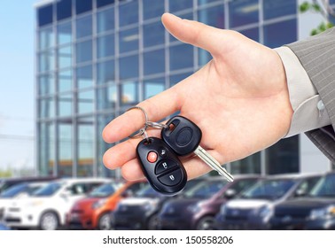 Hand Giving A Car Key. Auto Repair Service.