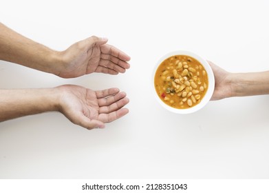 Hand Giving Soup Bowl Needy Person