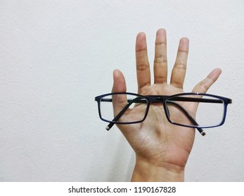 Hand And Glasses.No Work Done Without This Two. In Office At Penampang Baru, Kota Kinabalu, Sabah, Malaysia.