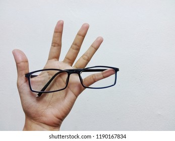 Hand And Glasses.No Work Done Without This Two. In Office At Penampang Baru, Kota Kinabalu, Sabah, Malaysia.