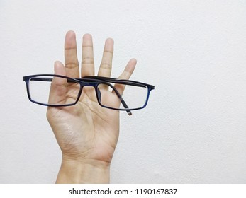 Hand And Glasses.No Work Done Without This Two. In Office At Penampang Baru, Kota Kinabalu, Sabah, Malaysia.