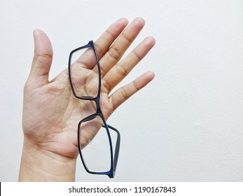 Hand And Glasses.No Work Done Without This Two. In Office At Penampang Baru, Kota Kinabalu, Sabah, Malaysia.