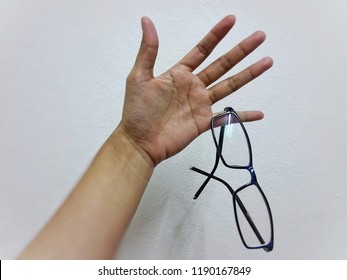 Hand And Glasses.No Work Done Without This Two. In Office At Penampang Baru, Kota Kinabalu, Sabah, Malaysia.