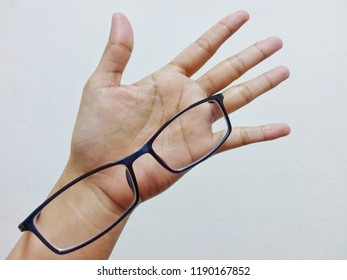 Hand And Glasses.No Work Done Without This Two. In Office At Penampang Baru, Kota Kinabalu, Sabah, Malaysia.