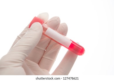 Hand In Glove Holding Vial Of Blood On White Background