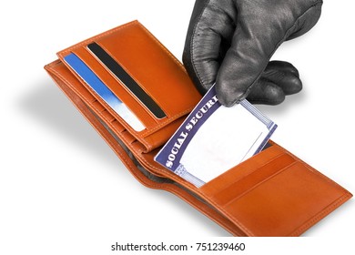 Hand In Glove Stealing A Social Security Card From A Wallet