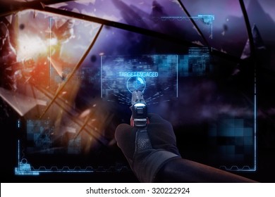 Hand in gloves holding a pointing straight handgun. First person view hand in black leather gloves holding a futuristic fantasy neon pointing straight handgun with neon red, blue indicator panels.